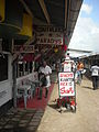 Image 57Butcher in the Central Market in Paramaribo with signs written in Dutch (from Suriname)