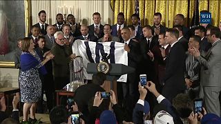 Cubs visit to the White House, Obama presented with 'W' flag (1).jpg