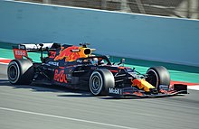 Formula One racing car in motion on a track