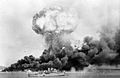 The explosion of an oil storage tank, hit during the first Japanese air raid on Darwin