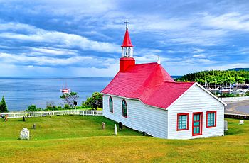 Old chapel, build 1747-1750 (the oldest wooden church in North-America) in Tadoussac, Quebec, Canada Photograph: Natidu Licensing: CC-BY-SA-3.0