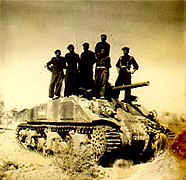 Pakistani troops on a knocked out Indian M4A4 Sherman.jpg