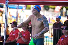 Caeleb Dressel before winning 100 fly (42769914221).jpg