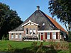 Stelp boerderij met koetshuis