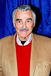 Burt Reynolds (skuespiller født 1936) med «alderstilpasset», grå tupé 2011.