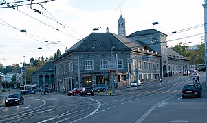 Station building with Bahnhof Enge tram stop (left) and Bhf. Enge/Bederstrasse tram/bus stop (right)