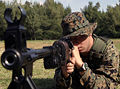 A marine aiming with a RPD