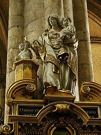 Détail du retable de la chapelle Notre-Dame du Puy : La Vierge sortant un enfant d'un puits.