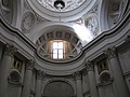 English: Pendents above the entrance with interior view of in lantern in façade. Also shown two tondi by Giuseppe Bernasconi and Giulio Bernasconi Nederlands: Pendentieven boven de ingang met binnenzijde van lantaarn in façade. Ook zijn twee tondo's te zien van Giuseppe Bernasconi en Giulio Bernasconi.