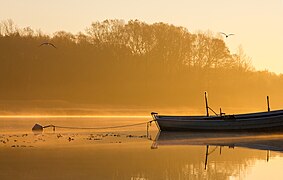 Lever de soleil sur le fleuve Pärnu