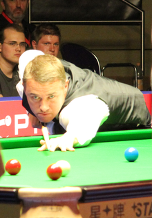 Stephen Hendry playing a shot