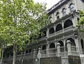 Tasma Terrace, East Melbourne. Victorian Free Classical terrace with filigree verandahs; completed 1879. The headquarters of the National Trust (Victoria).[43]