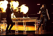 Description de l'image Paula & Ovi - Playing with Fire (2nd Semi-final).jpg.