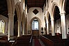 The nave, the paintings visible above the arches