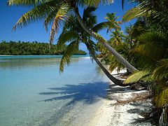 Tapuaetai (illa d'un peu) a la part sud d'Aitutaki