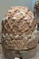 An omphalos found Northeast of the temple, likely a later reproduction of the one that stood in the adyton. Delphi, Greece. Hellenistic or Roman. Delphi Archaeological Museum, Delphi.