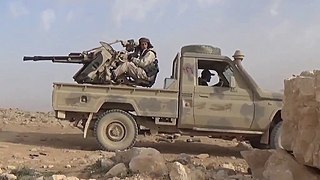 Technical armed with a ZPU-2 heavy machine gun operated by the Free Syrian Army during clashes with ISIS in the eastern Qalamoun Mountains, southern Syria, 2017