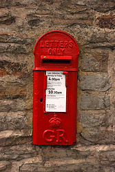 A GR lamp box in a wall at Cutthorpe, Derbyshire.