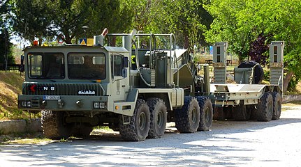 Kynos Aljaba 8x8 tank transporter tractor with wide-footprint tires