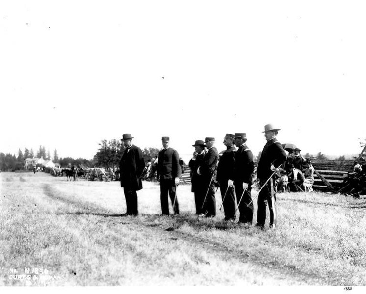 File:Washington state Governor Henry McBride and his staff, standing in a field (CURTIS 731).jpeg