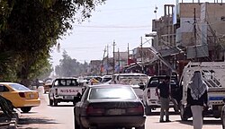 Main street of Al-Aziziyah, April 2018