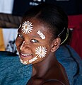 Image 23Malagasy girl in Nosy Be wearing masonjoany, an endemic decorative and protective paste made from ground wood (from Culture of Madagascar)