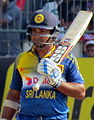 Kumar Sangakkara. This Image is Licensed under Creative Commons Attribution Share-Alike 4.0 International. The Author is Credited as "Amal Amarasinha".