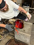 Blenko glassware being trimmed.jpg