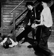 White men stone a black man during the 1919 Chicago race riots.