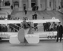 After landing in front of the steps.