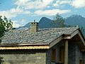 Image 2Alpine chalet being built in Haute-Maurienne (Savoy), the use of thick pieces of orthogneiss (4–7 cm) is by the strict architectural regulations in the region bordering the national parks of Vanoise-Grand Paradis. (from Alps)