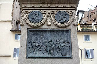 Relief föreställande Giordano Bruno på bålet. Medaljongerna föreställer John Wycliffe och Jan Hus.