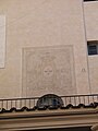 English: Fresco with emblem of Trinitarian Order above roof first floor of cloister San Carlino Nederlands: Fresco met wapen van Trinitariërs, boven dak eerste verdieping kruisgang San Carlino.