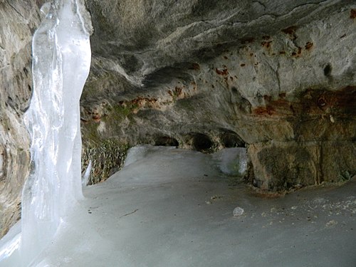 An image taken in the Eben Ice Caves. This is a seasonal tourist attraction in the Upper Peninsula of Michigan. This particular image is of ice flowing down onto a small rock shelf.