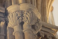 Detail of the sculpted capitals of clustered columns in the nave