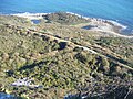 Both pans seen from the cliff top again, with the coastal path running further above the pans.