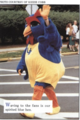 Blue Hen mascot walking and waving on crosswalk.