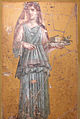 Fresco of woman with tray