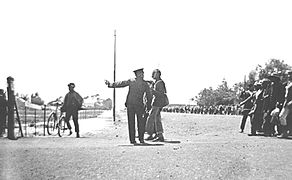 Gandhi and policeman 1913.jpg