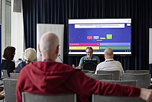 Vortrag während öffentliches Programm während der WikiCon 2023 in Linz, Österreich.