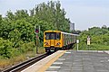 A Merseyrail Class 507 departs towards Liverpool.