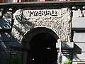 Stonework of the former Imperial name and 1894 date, above the Washington Street entrance