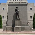 Bronze statue of a standing man