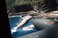 An aerial view of the capsized Philippine destroyer escort BRP Datu Kalantiaw during the Military Airlift Command's Aerospace Rescue and Recovery Service rescue operations.