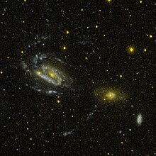 NGC 3169 3166 3165 GALEX WikiSky.jpg