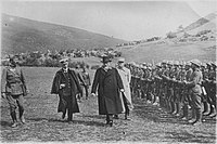 Venizelos reviews a section of the Greek army on the Macedonian front in 1918. He is accompanied by Admiral Pavlos Kountouriotis (left) and General Maurice Sarrail (right).