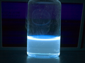 Perylene dissolved in dichloromethane exposed to Long Wave UV Light