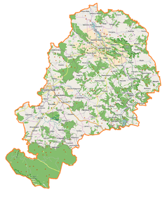 Mapa konturowa powiatu lwóweckiego, po lewej nieco na dole znajduje się punkt z opisem „Ratusz w Mirsku”