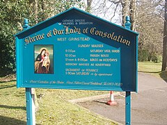 Shrine of Our Lady of Consolation Church notice board, at West Grinstead, West Sussex.jpg