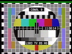 Off-air screen capture of a Canal 9 Argentina PAL circle pattern with clock cutout (PM5534), transmitted in 1984.